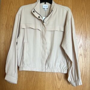 Nine West utility jacket.  Size M.  Beige.  Zip front with snap closure.